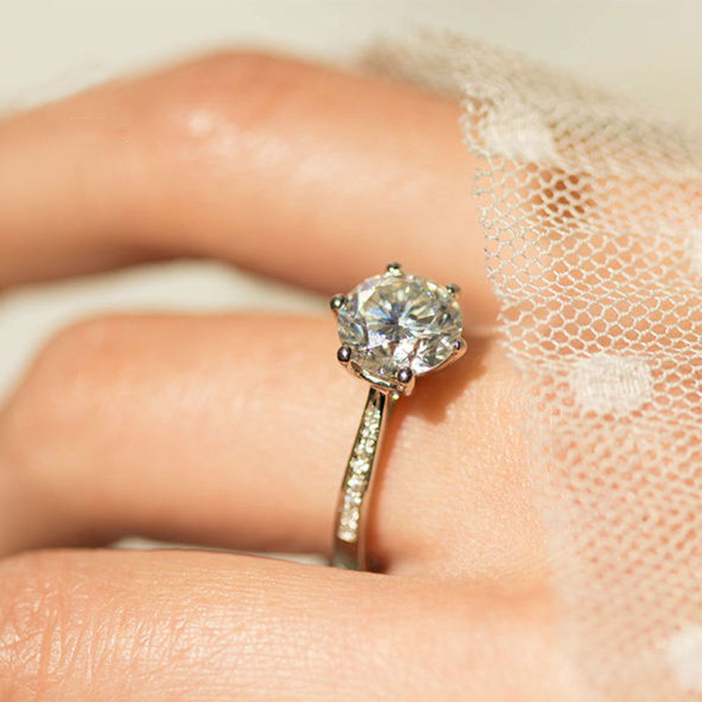 BOYA 2.09 CTW Round Moissanite Six Prong with Side Accents Engagement Ring in 18K White Gold Plated
