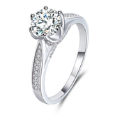 BOYA 1.20 CTW Round Moissanite Six Prong Solitaire with Side Accents Engagement Ring in 18K White Gold Plated