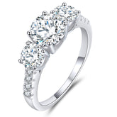 BOYA 2.66 CTW Round Moissanite Three Stone with Side Accents Engagement Ring in 18K White Gold Plated